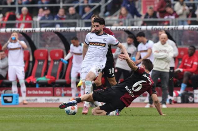 21 03 2026 Soccer Season 2025 2026 2 Soccer Bundesliga 27 Matchday 1 FC Nürnberg FCN Club 1 FC Kaiserslautern FCK Rote Roten Teufel Sportfoto Zink DaMa xdaxmax DFL regulations prohibit any use of photographs as image sequences and or quasi video only for editorial use Semih Sahin 8, 1 FC Kaiserslautern FCK Adam Markhiev 6, 1 FC Nürnberg FCN