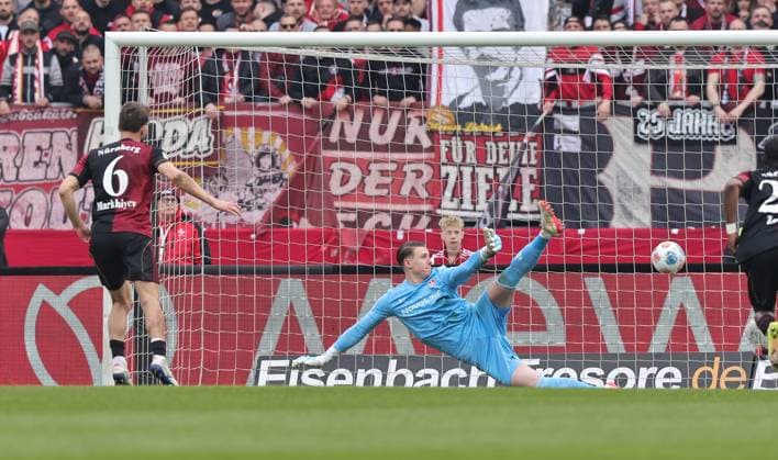 21 03 2026 Soccer Season 2025 2026 2 Soccer Bundesliga 27 Matchday 1 FC Nürnberg FCN Club 1 FC Kaiserslautern FCK Rote Roten Teufel Sportfoto Zink DaMa xdaxmax DFL regulations prohibit any use of photographs as image sequences and or quasi video only for editorial use Tor Treffer Goal shot for 2 0 Goal scorer Adam Markhiev 6, 1 FC Nürnberg FCN by penalty kick against Julian Krahl 1, 1 FC Kaiserslautern FCK