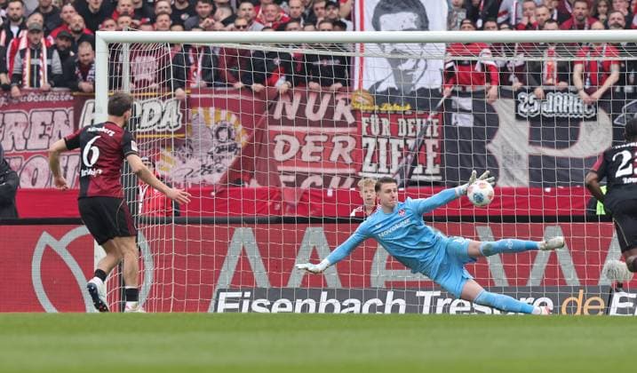 21 03 2026 Soccer Season 2025 2026 2 Soccer Bundesliga 27 Matchday 1 FC Nürnberg FCN Club 1 FC Kaiserslautern FCK Rote Roten Teufel Sportfoto Zink DaMa xdaxmax DFL regulations prohibit any use of photographs as image sequences and or quasi video only for editorial use Tor Treffer Goal shot for 2 0 Goal scorer Adam Markhiev 6, 1 FC Nürnberg FCN by penalty kick against Julian Krahl 1, 1 FC Kaiserslautern FCK