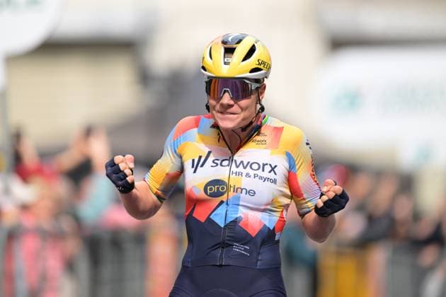 Belgian Lotte Kopecky celebrates as she crosses the finish line to win the Milano-Sanremo one day cycling race for women, 298km from Milan to San Remo, Italy, Saturday 21 March 2026. DAVIDxPINTENS  x168453709x