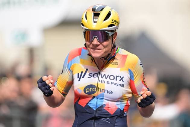 Belgian Lotte Kopecky celebrates as she crosses the finish line to win the Milano-Sanremo one day cycling race for women, 298km from Milan to San Remo, Italy, Saturday 21 March 2026. DAVIDxPINTENS  x168454099x