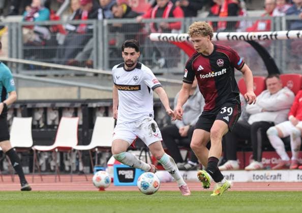 21 03 2026 Soccer Season 2025 2026 2 Soccer Bundesliga 27 Matchday 1 FC Nürnberg FCN Club 1 FC Kaiserslautern FCK Rote Roten Teufel Sportfoto Zink DaMa xdaxmax DFL regulations prohibit any use of photographs as image sequences and or quasi video only for editorial use Semih Sahin 8, 1 FC Kaiserslautern FCK Piet Scobel 39, 1 FC Nürnberg FCN
