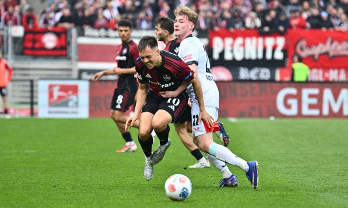 21 03 2026 Soccer Season 2025 2026 2 Soccer Bundesliga 27 Matchday 1 FC Nürnberg FCN Club 1 FC Kaiserslautern FCK Rote Roten Teufel Sportfoto Zink xwoxzix DFL regulations prohibit any use of photographs as image sequences and or quasi video only for editorial use Julian Justvan 10, 1 FC Nürnberg FCN Mika Haas 22, 1 FC Kaiserslautern FCK
