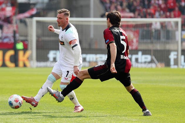 21 03 2026, xrekx, Fußball 2 Bundesliga, 1 FC Nuernberg 1 FC Kaiserslautern v l Marlon Ritter 1 FC Kaiserslautern Tom Baack 1 FC Nuernberg Zweikampf, Aktion, action, battle for the ball DFL DFB REGULATIONS PROHIBIT ANY USE OF PHOTOGRAPHS as IMAGE SEQUENCES and or QUASI VIDEO Nuernberg