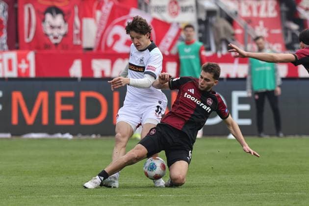 21 03 2026 Soccer Season 2025 2026 2 Soccer Bundesliga 27 Matchday 1 FC Nürnberg FCN Club 1 FC Kaiserslautern FCK Rote Roten Teufel Sportfoto Zink DaMa xdaxmax DFL regulations prohibit any use of photographs as image sequences and or quasi video only for editorial use Leon Robinson 37, 1 FC Kaiserslautern FCK Adam Markhiev 6, 1 FC Nürnberg FCN