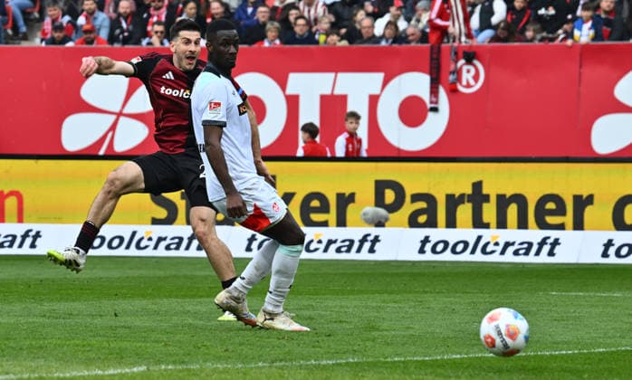 21 03 2026 Soccer Season 2025 2026 2 Soccer Bundesliga 27 Matchday 1 FC Nürnberg FCN Club 1 FC Kaiserslautern FCK Rote Roten Teufel Sportfoto Zink xwoxzix DFL regulations prohibit any use of photographs as image sequences and or quasi video only for editorial use Luka Lochoshvili 24, 1 FC Nürnberg FCN scores goal Goal shot for 3 0 against Maxwell Gyamfi 4, 1 FC Kaiserslautern FCK