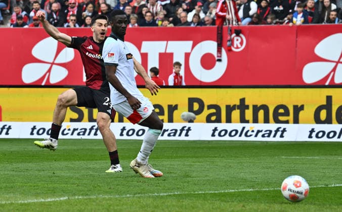 21 03 2026 Soccer Season 2025 2026 2 Soccer Bundesliga 27 Matchday 1 FC Nürnberg FCN Club 1 FC Kaiserslautern FCK Rote Roten Teufel Sportfoto Zink xwoxzix DFL regulations prohibit any use of photographs as image sequences and or quasi video only for editorial use Luka Lochoshvili 24, 1 FC Nürnberg FCN scores goal Goal shot for 3 0 against Maxwell Gyamfi 4, 1 FC Kaiserslautern FCK