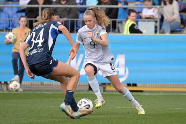 Vivien Endemann VfL Wolfsburg, 25 am with ball in duel with Svenja Voehringer TSG 1899 Hoffenheim, 34 GER, TSG 1899 Hoffenheim vs VfL Wolfsburg, Football, Google Pixel Frauen Bundesliga, Saison 2025 2026, 21 03 2026 DFB DFL regulations prohibit any use of photographs as image sequences and or quasi video GER, TSG 1899 Hoffenheim vs VfL Wolfsburg, Football, Google Pixel Frauen Bundesliga, Saison 2025 2026, 21 03 2026 Hoffenheim Copyright: xEibner-Pressefoto TobiasxBaurx EP_TBR