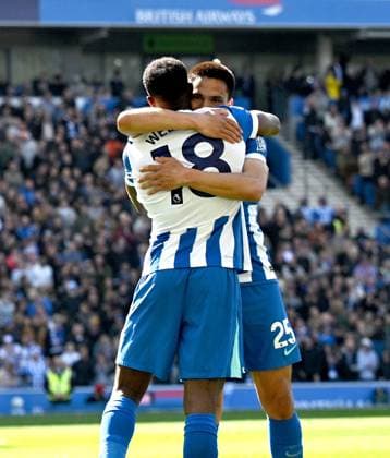 Danny Welbeck of Brighton is hugged by Diego Gomez of Brighton after scoring the opening goal during the Premier League match between Brighton and Hove Albion and Liverpool at the American Express Stadium , Brighton , UK - 21st March 2026 Brighton & Hove Albion vs Liverpool Premier League Football, Amex Stadium, Sussex, United Kingdom - 21 Mar 2026Brighton Amex Stadium Sussex United Kingdom Editorial use only. No merchandising. For Football images FA and Premier League restrictions apply inc. no internet mobile usage without FAPL license - for details contact Football Dataco  Copyright: xSimonxDack TPI Shutterstockx 16784403w