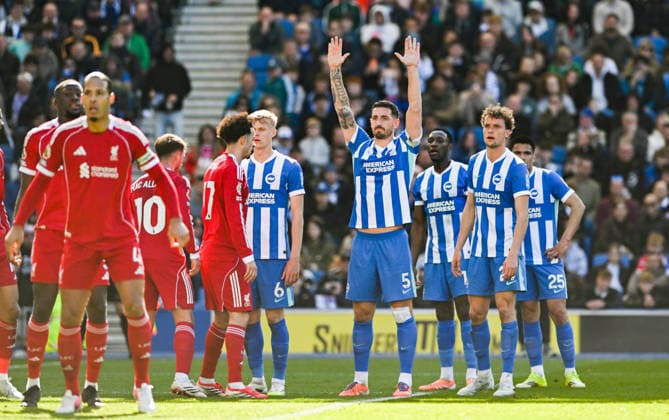 Lewis Dunk of Brighton calls for the ball during the Premier League match between Brighton and Hove Albion and Liverpool at the American Express Stadium , Brighton , UK - 21st March 2026 Brighton & Hove Albion vs Liverpool Premier League Football, Amex Stadium, Sussex, United Kingdom - 21 Mar 2026Brighton Amex Stadium Sussex United Kingdom Editorial use only. No merchandising. For Football images FA and Premier League restrictions apply inc. no internet mobile usage without FAPL license - for details contact Football Dataco  Copyright: xSimonxDack TPI Shutterstockx 16784403x
