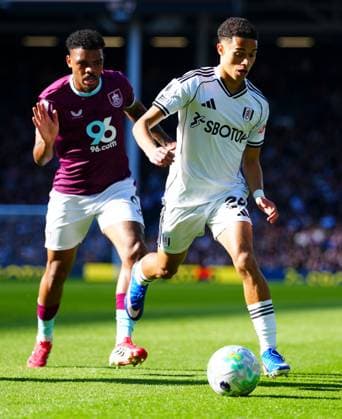 Lyle Foster of Burnley watches Josh King of Fulham Fulham v Burnley, Premier League, Football, Craven Cottage, London, UK - 21 Mar 2026London Craven Cottage United Kingdom EDITORIAL USE ONLY No use with unauthorised audio, video, data, fixture lists, club league logos or live services. Online in-match use limited to 120 images, no video emulation. No use in betting, games or single club league player publications. Copyright: xJavierxGarcia Shutterstockx 16783259ai