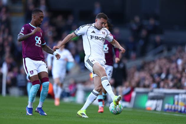 21st March 2026; Craven Cottage, Fulham, London, England; Premier League Football, Fulham versus Burnley; Timothy Castagne of Fulham under pressure from Jaidon Anthony of Burnley  JPxFletcher Content restricted for UK based newspaper