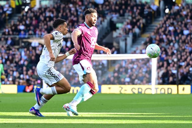 Fulham v Burnley, Premier League Burnley midfielder Josh Laurent (29) under pressure from Fulham midfielder Josh King (24) during the Premier League match between Fulham and Burnley at Craven Cottage, London, UK on 21 March 2026. London Craven Cottage Greater London UK Editorial use only DataCo restrictions apply See www.football-dataco.com , Copyright: xDennisxGoodwinx PSI-23930-0025