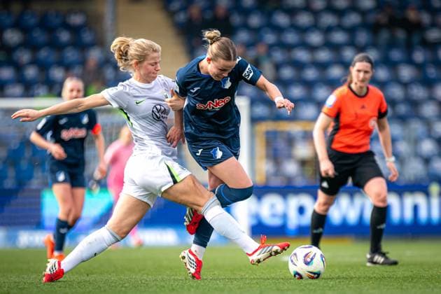 Justine Kielland 18 VFL Wolfsburg in a duel with Valesca Ampoorter 18 TSG Hoffenheim for the ball GPFBL TSG Hoffenheim VfL Wolfsburg Copyright: xSpeedshotx