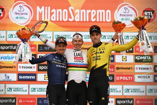 British Tom Pidcock, Slovenian Tadej Pogacar and Belgian Wout van Aert pictured on the podium after the Milano-Sanremo one day cycling race for men, 298km from Milan to San Remo, Italy, Saturday 21 March 2026. DAVIDxPINTENS  x168475176x