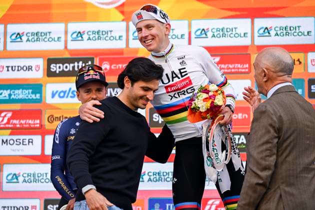Milan Sanremo 2026 Cycling Race SANREMO, ITALY - MARCH 21 : Pogacar Tadej (SLO) of UAE Team Emirates - XRG and Carlos Sainz on the podium during the 117th edition of Milan Sanremo an UCI World Tour 1.UWT one day cycling road race for Men Elite of 298 km with start in Pavia and finish in Sanremo on March 21, 2026 in Sanremo, Italy, 21 03 2026 ( Motordriver Guy De Vuyst - Sanremo Italy  Copyright: xNicoxVereeckenx