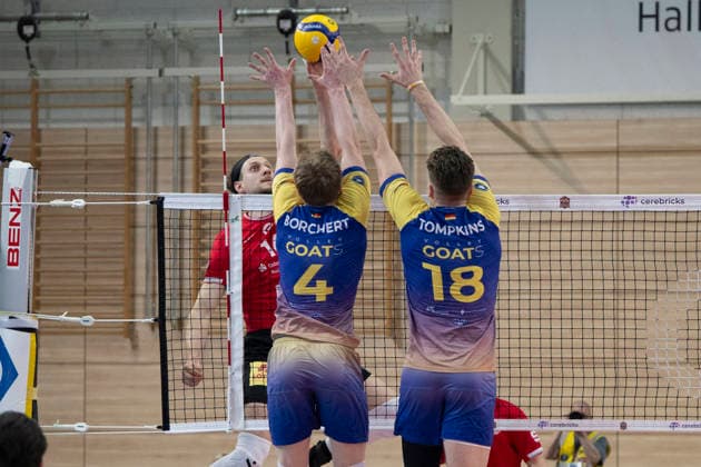 1 Volleyball Bundesliga Season 2025 2026 Cerebricks Volley Goats Mitteldeutschland vs SV Warnemünde Halle, Germany 21 March 2026 In the picture from left Jan Philipp Krabel Warnemuende , Tom Borchert Bitterfeld and Dax Tompkins Bitterfeld Halle Saale swh Arena Sachsen Anhalt Germany