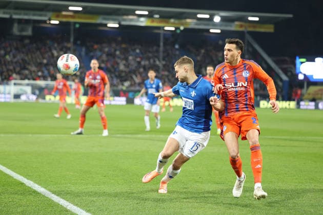 21 03 2026, xrekx, Soccer 2 Bundesliga, SV Darmstadt 98 FC Schalke 04 v l Fabian Nürnberger Nuernberger SV Darmstadt 98 Dejan Ljubicic FC Schalke 04 Zweikampf, Aktion, action, battle for the ball DFL DFB REGULATIONS PROHIBIT ANY USE OF PHOTOGRAPHS as IMAGE SEQUENCES and or QUASI VIDEO Darmstadt