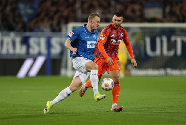 21 03 2026, Soccer 2 Bundesliga, SV Darmstadt 98 FC Schalke 04, v l , Isac Lidberg SV Darmstadt 98 , Hasan Kurucay FC Schalke 04 DFL DFB REGULATIONS PROHIBIT ANY USE OF PHOTOGRAPHS AS IMAGE SEQUENCES AND OR QUASI VIDEO xdcx Copyright: HMBxMedia Claus