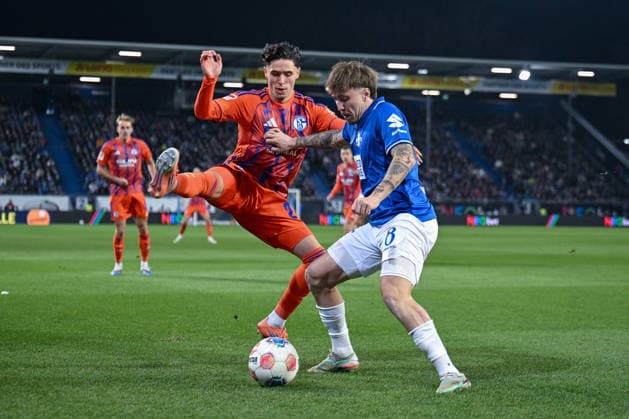 21 03 2026, Soccer, 2 Bundesliga, Season 2025 2026, Matchday 26, SV Darmstadt 98 FC Schalke 04, Soufiane El Faouzi FC Schalke 04 , Luca Marseiler SV Darmstadt , xRHR PHOTO YYx Copyright: KROEGER RHR-FOTOx RHR-FOTO YY