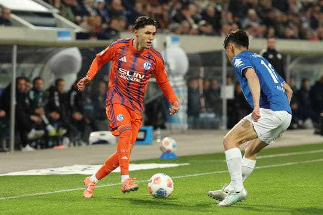 2025 03 21 xjfx Soccer 2 Bundesliga SV Darmstadt 98 FC Schalke 04 v l , Soufiane El Faouzi FC Schalke 04 , Hiroki Akiyama SV Darmstadt 98 , zweikampf, action, aktion, battles for the Ball DFL DFB REGULATIONS PROHIBIT ANY USE OF PHOTOGRAPHS as IMAGE SEQUENCES and or QUASI VIDEO Copyright: JoaquimxFerreira