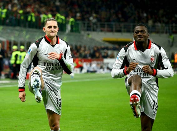 MILAN, ITALY - MARCH 21: Adrien Rabiot of AC Milan celebrates with teammate Youssouf Fofana after scoring his team second goal ,during the Serie A match between AC Milan and Torino FC at Giuseppe Meazza Stadium on March 21, 2026 in Milan, Italy.  Copyright: xMBxMediax