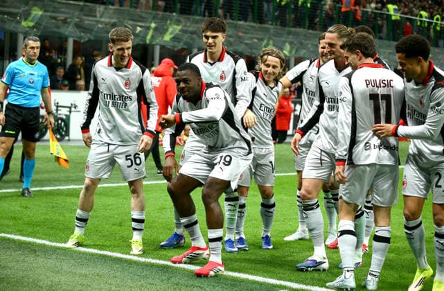 MILAN, ITALY - MARCH 21: Youssouf Fofana of AC Milan celebrates with teammates after scoring his team third goal ,during the Serie A match between AC Milan and Torino FC at Giuseppe Meazza Stadium on March 21, 2026 in Milan, Italy.  Copyright: xMBxMediax