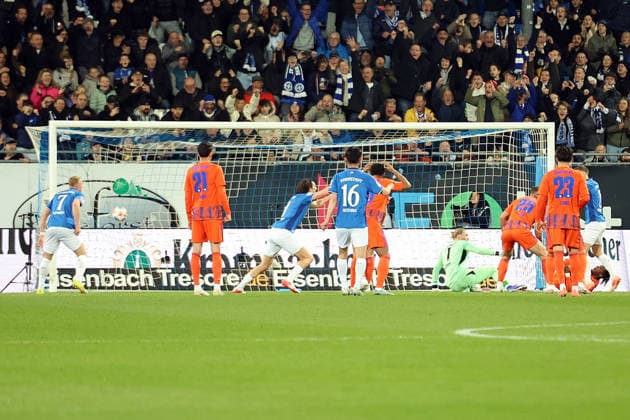 21 03 2026, xrekx, Soccer 2 Bundesliga, SV Darmstadt 98 FC Schalke 04 v l Goal for 1 0 does not count Fraser Hornby SV Darmstadt 98 Loris Karius FC Schalke 04 DFL DFB REGULATIONS PROHIBIT ANY USE OF PHOTOGRAPHS as IMAGE SEQUENCES and or QUASI VIDEO Darmstadt