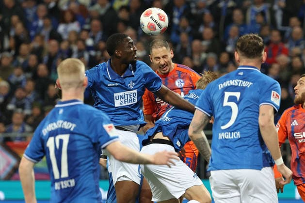 2025 03 21 xjfx Soccer 2 Bundesliga SV Darmstadt 98 FC Schalke 04 v l , Patric Pfeiffer SV Darmstadt 98 , Nikola Katic FC Schalke 04 , header, header duel, aerial duel DFL DFB REGULATIONS PROHIBIT ANY USE OF PHOTOGRAPHS as IMAGE SEQUENCES and or QUASI VIDEO Copyright: JoaquimxFerreira