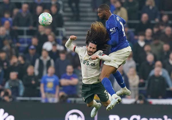 Liverpool, England, 21st March 2026. Beto of Everton (R) wins a header from Marc Cucurella of Chelsea during the Everton vs Chelsea Premier League match at Hill Dickinson Stadium, Liverpool. Picture credit should read: Andrew Yates Sportimage EDITORIAL USE ONLY. No use with unauthorised audio, video, data, fixture lists, club league logos or live services. Online in-match use limited to 120 images, no video emulation. No use in betting, games or single club league player publications. SPI_043_AY_EVERTON_CHELSEA SPI-4630-0042