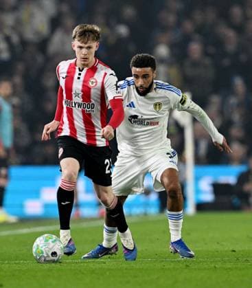 Keane Lewis-Potter of Brentford and Jayden Bogle of Leeds United Leeds v Brentford, Premier League, Football, Elland Road, Leeds, UK - 21 Mar 2026Leeds Elland Road United Kingdom EDITORIAL USE ONLY No use with unauthorised audio, video, data, fixture lists, club league logos or live services. Online in-match use limited to 120 images, no video emulation. No use in betting, games or single club league player publications. Copyright: xAnnaxGowthorpe Shutterstockx 16783311v