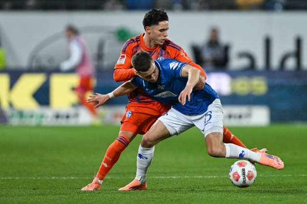 Soufiane El Faouzi FC Schalke 04, 23 in duel with Fabian Nürnberger SV Darmstadt 1898, 15 GER, SV Darmstadt 98 vs FC Schalke 04, Soccer 2 Bundesliga, Matchday 27, Season 2025 2026, 21 03 2026 DFL regulations prohibit any use of photographs as image sequences and or quasi video GER, SV Darmstadt 98 vs FC Schalke 04, Soccer 2 Bundesliga, Matchday 27, Season 2025 2026, 21 03 2026 Darmstadt Copyright: xEibner-Pressefoto FlorianxWiegandx EP_FWD