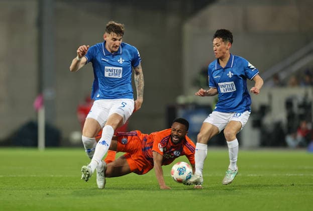 21 03 2026, Football 2 Bundesliga, SV Darmstadt 98 FC Schalke 04, v l , Matej Maglica SV Darmstadt 98 , Moussa Sylla FC Schalke 04 , Hiroki Akiyama SV Darmstadt 98 DFL DFB REGULATIONS PROHIBIT ANY USE OF PHOTOGRAPHS AS IMAGE SEQUENCES AND OR QUASI VIDEO xdcx Copyright: HMBxMedia Claus