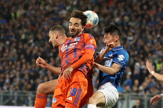 2025 03 21 xjfx Soccer 2 Bundesliga SV Darmstadt 98 FC Schalke 04 v l , Kenan Karaman FC Schalke 04 , Hiroki Akiyama SV Darmstadt 98 , header, header duel, aerial duel DFL DFB REGULATIONS PROHIBIT ANY USE OF PHOTOGRAPHS as IMAGE SEQUENCES and or QUASI VIDEO Copyright: JoaquimxFerreira