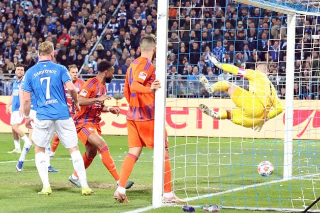 21 03 2026, xrekx, Soccer 2 Bundesliga, SV Darmstadt 98 FC Schalke 04 v l Header to 0 1 by Moussa Sylla FC Schalke 04 Marcel Schuhen SV Darmstadt 98 DFL DFB REGULATIONS PROHIBIT ANY USE OF PHOTOGRAPHS as IMAGE SEQUENCES and or QUASI VIDEO Darmstadt