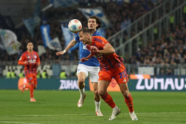 2025 03 21 xjfx Soccer 2 Bundesliga SV Darmstadt 98 FC Schalke 04 v l , Nikola Katic FC Schalke 04 , Fraser Hornby SV Darmstadt 98 in aktion, in action, DFL DFB REGULATIONS PROHIBIT ANY USE OF PHOTOGRAPHS as IMAGE SEQUENCES and or QUASI VIDEO Copyright: JoaquimxFerreira