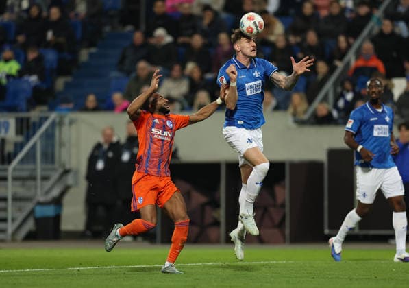 21 03 2026, Football 2 Bundesliga, SV Darmstadt 98 FC Schalke 04, v l , Moussa Sylla FC Schalke 04 , Matej Maglica SV Darmstadt 98 DFL DFB REGULATIONS PROHIBIT ANY USE OF PHOTOGRAPHS AS IMAGE SEQUENCES AND OR QUASI VIDEO xdcx Copyright: HMBxMedia Claus