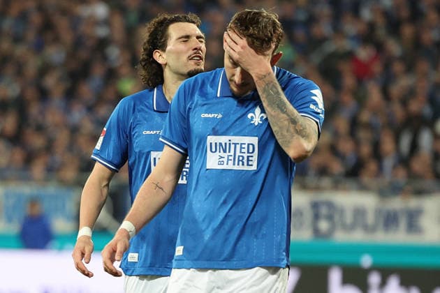 21 03 2026, xrekx, Fußball 2 Bundesliga, SV Darmstadt 98 FC Schalke 04 v l Fraser Hornby SV Darmstadt 98 Matej Maglica SV Darmstadt 98 enttaeuscht, enttäuscht, schaut enttaeuscht, niedergeschlagen, disappointed DFL DFB REGULATIONS PROHIBIT ANY USE OF PHOTOGRAPHS as IMAGE SEQUENCES and or QUASI VIDEO Darmstadt