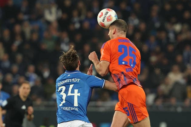 2025 03 21 xjfx Soccer 2 Bundesliga SV Darmstadt 98 FC Schalke 04 v l , Kilian Julian Corredor SV Darmstadt 98 , Nikola Katic FC Schalke 04 header, header duel, aerial duel DFL DFB REGULATIONS PROHIBIT ANY USE OF PHOTOGRAPHS as IMAGE SEQUENCES and or QUASI VIDEO Copyright: JoaquimxFerreira