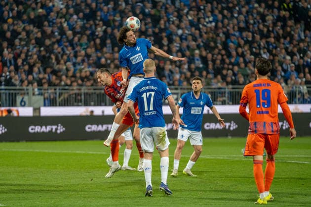 2 Bundesliga SV Darmstadt 98 vs FC Schalke 04, Merck Stadion am Böllenfalltor, 21 03 2026 Header by Fraser Hornby SV Darmstadt 98, 9 2 Bundesliga SV Darmstadt 98 vs FC Schalke 04, Merck Stadion am Böllenfalltor, 21 03 2026 DFB DFL REGULATIONS PROHIBIT ANY USE OF PHOTOGRAPHS AS IMAGE SEQUENCES AND OR QUASI VIDEO Copyright: xBEAUTILUSxSPORTS Hillx