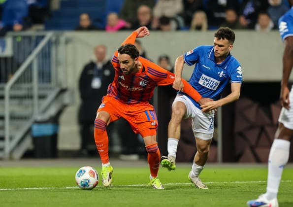 21 03 2026, Football 2 Bundesliga, SV Darmstadt 98 FC Schalke 04, v l , Kenan Karaman FC Schalke 04 , Sergio Lopez SV Darmstadt 98 DFL DFB REGULATIONS PROHIBIT ANY USE OF PHOTOGRAPHS AS IMAGE SEQUENCES AND OR QUASI VIDEO xdcx Copyright: HMBxMedia Claus