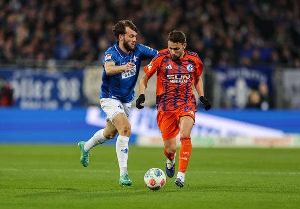 21 03 2026, Football 2 Bundesliga, SV Darmstadt 98 FC Schalke 04, v l , Adil Aouchiche FC Schalke 04 , Killian Corredor SV Darmstadt 98 DFL DFB REGULATIONS PROHIBIT ANY USE OF PHOTOGRAPHS AS IMAGE SEQUENCES AND OR QUASI VIDEO xdcx Copyright: HMBxMedia Claus