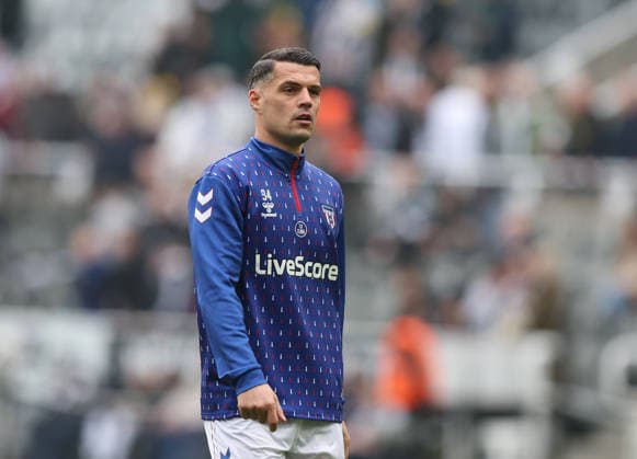 Newcastle Upon Tyne, England, 22nd March 2026. Granit Xhaka of Sunderland warms up during the Newcastle United vs Sunderland Premier League match at St. James Park, Newcastle Upon Tyne. Picture credit should read: Nigel Roddis Sportimage EDITORIAL USE ONLY. No use with unauthorised audio, video, data, fixture lists, club league logos or live services. Online in-match use limited to 120 images, no video emulation. No use in betting, games or single club league player publications. SPI_027_NR_NEWC_SUND SPI-4633-0027