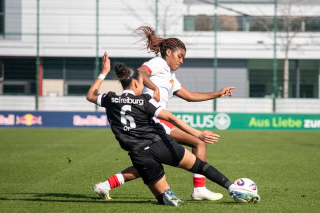 GER, Leipzig, Soccer, Google Pixel Women Bundesliga, 21 Matchday, RB Leipzig vs SC Freiburg in the picture from l Nicole Ojukwu SC Freiburg 06 , Delice Boboy RB Leipzig 17 , duel, 22 03 2025, RB Leipzig Training Academy Cottaweg Leipzig DFB REGULATIONS PROHIBIT ANY USE OF PHOTOGRAPHS AS IMAGE SEQUENCES AND OR QUASI VIDEO, Copyright: HMBxMedia PaulxFritz