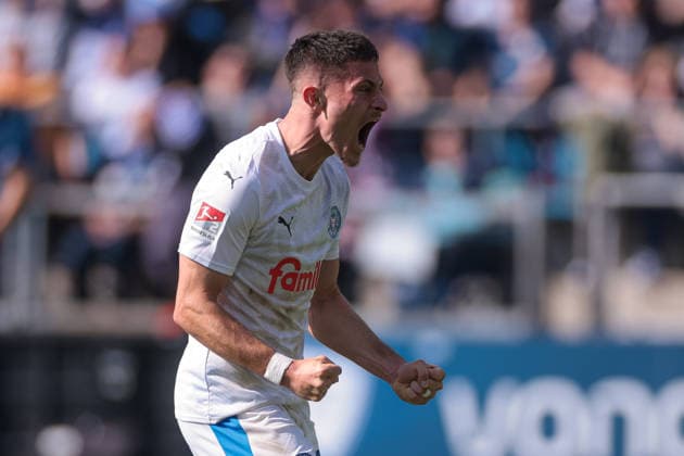 22 03 2026, Soccer, 2 Bundesliga, Matchday 27, VfL Bochum 1848 Holstein Kiel Adrian Kapralik Holstein Kiel celebrates the goal to 1 2 by Phil Harres Holstein Kiel Bochum Vonovia Ruhrstadion NRW Germany xRHR PHOTO DEx Copyright: DennisxEwert RHR-FOTOx RHR-FOTO DE