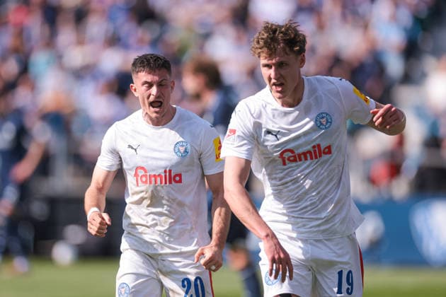 22 03 2026, Soccer, 2 Bundesliga, Matchday 27, VfL Bochum 1848 Holstein Kiel v l Adrian Kapralik Holstein Kiel , Phil Harres Holstein Kiel celebrate the goal for 1 2 Bochum Vonovia Ruhrstadion NRW Germany xRHR PHOTO DEx Copyright: DennisxEwert RHR-FOTOx RHR-FOTO DE