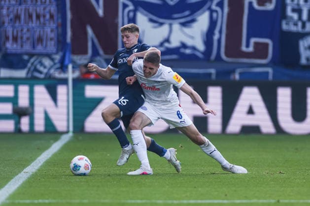 22 03 2026, Soccer, 2 Bundesliga, Matchday 27, VfL Bochum 1848 Holstein Kiel v l Callum Marshall VfL Bochum 1848 , Marko Ivezic Holstein Kiel Bochum Vonovia Ruhrstadion NRW Germany xRHR PHOTO DEx Copyright: DennisxEwert RHR-FOTOx RHR-FOTO DE