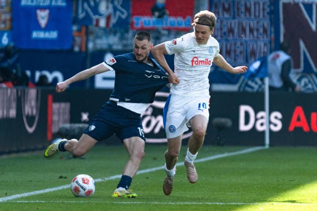Germany 2 Bundesliga 2025 2026 Matchday 27, VfL Bochum vs Holstein Kiel Sunday, 22 03 2026 Vonovia Ruhr Stadion, North Rhine-Westphalia Callum Marshall VfL Bochum, 16 Jonas Therkelsen Holstein Kiel, 10 Copyright: xCelinaxLeiersx