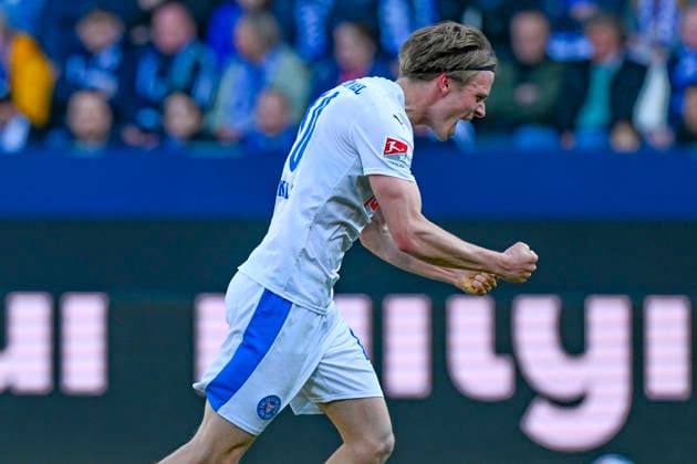 Jonas Therkelsen Kiel 10 cheers after scoring 2 3 20 02 2026 ¢ Football ¢ VfL Bochum vs Holstein Kiel , Vonovia Ruhrstadion, Bochum, DFB DFL REGULATIONS PROHIBIT ANY USE OF PHOTOGRAPHS AS IMAGE SEQUENCES AND OR QUASI VIDEO Copyright: xpepphotox xHorstxMauelshagenx pep00321, pep_20260322_hm_315365