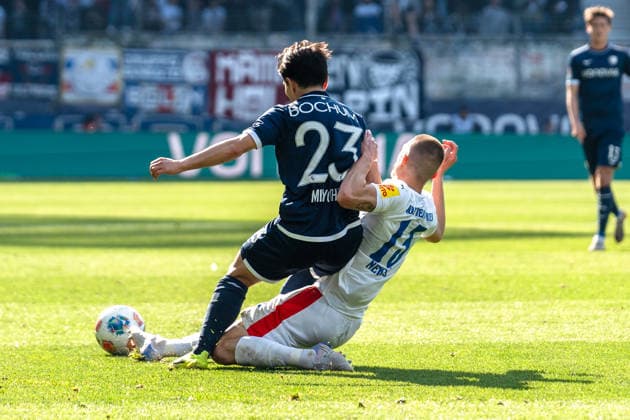 Germany 2 Bundesliga 2025 2026 Matchday 27, VfL Bochum vs Holstein Kiel Sunday, 22 03 2026 Vonovia Ruhr Stadion, North Rhine-Westphalia Koji Miyoshi VfL Bochum, 23 Ivan Nekic Holstein Kiel, 13 Copyright: xCelinaxLeiersx